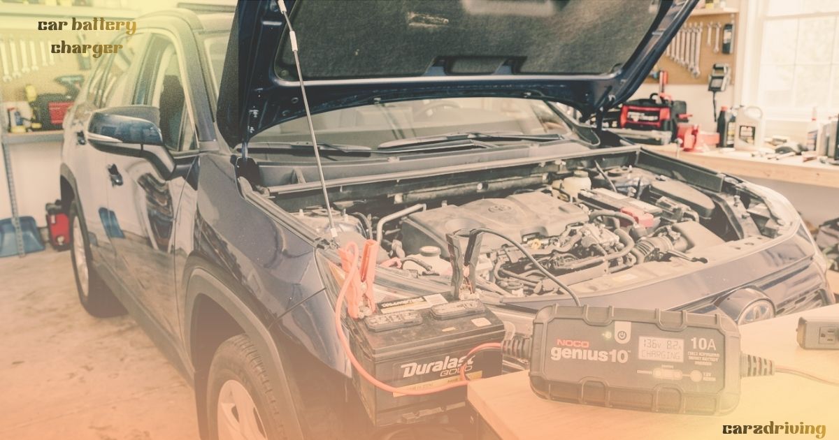 Car battery charger connected to a vehicle battery under the open hood of an SUV inside a garage workshop, charging the battery for maintenance and power restoration.