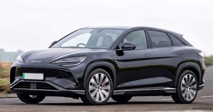 BYD black electric SUV coupe on UK road representing the rise of Chinese cars in the UK market