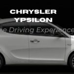Side view of a white Chrysler Ypsilon hatchback against a solid black background, featuring the text "Chrysler Ypsilon The Driving Experience."