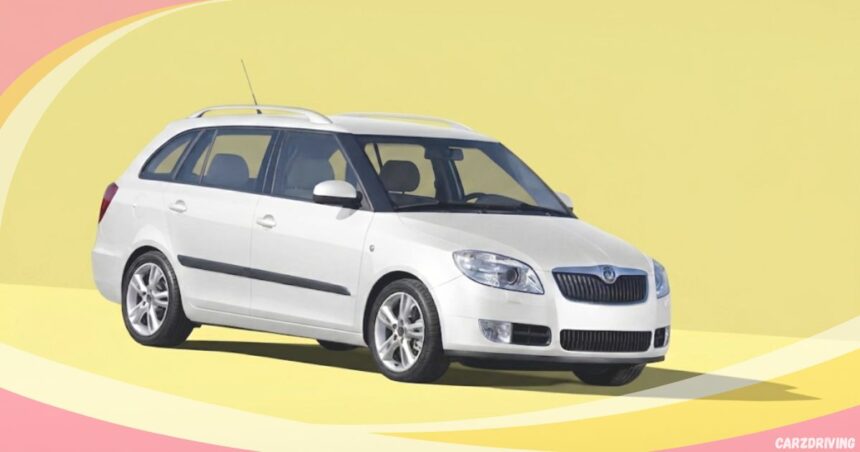 White Škoda Fabia station wagon with roof rails and alloy wheels, isolated on a yellow background.