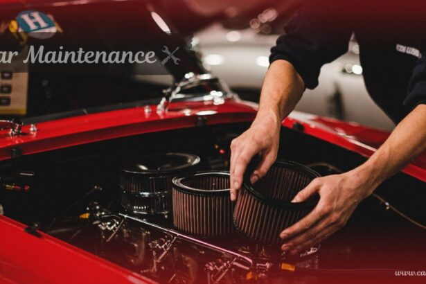 Mechanic replacing engine air filters during routine car maintenance on a classic red car
