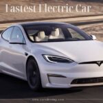 White Tesla Model S Plaid driving on a road, representing the fastest electric car in production.