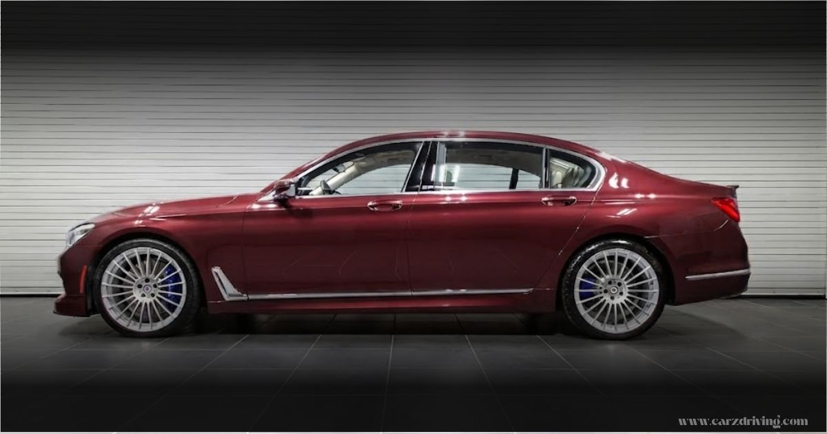 Side view of the luxury Alpina BMW model, highlighting its elegant body lines and characteristic multi-spoke wheels.
