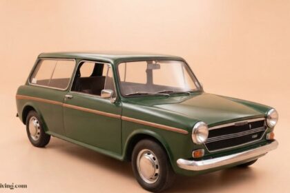 Vintage green Austin 1300 classic car for sale, showcasing the iconic British compact estate design.