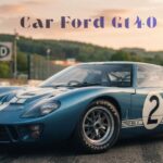 Classic blue Car Ford GT40 Mk II race car number 2 with white stripes on a race track
