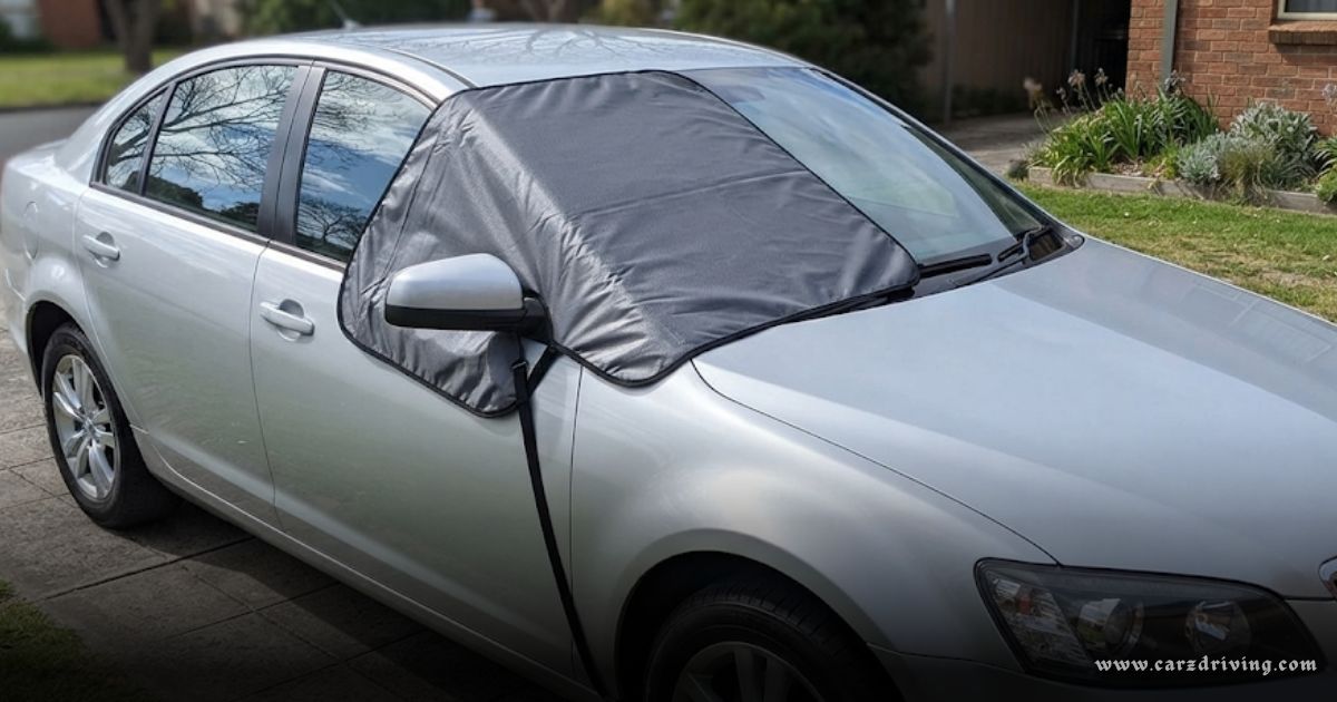 This protective car windscreen cover is shown installed on a silver vehicle to demonstrate its fit and coverage.