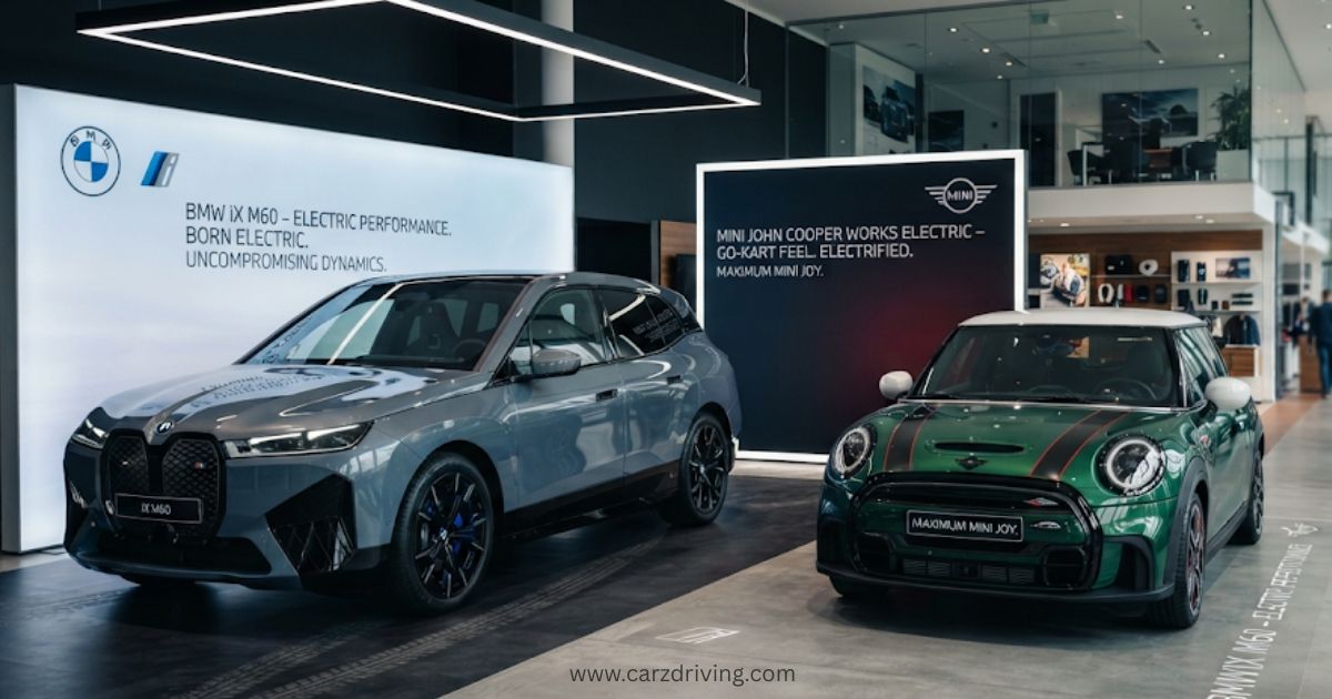 BMW iX M60 crossover SUV and MINI John Cooper Works Electric on display inside a dealership showroom featuring the fastest electric car models.