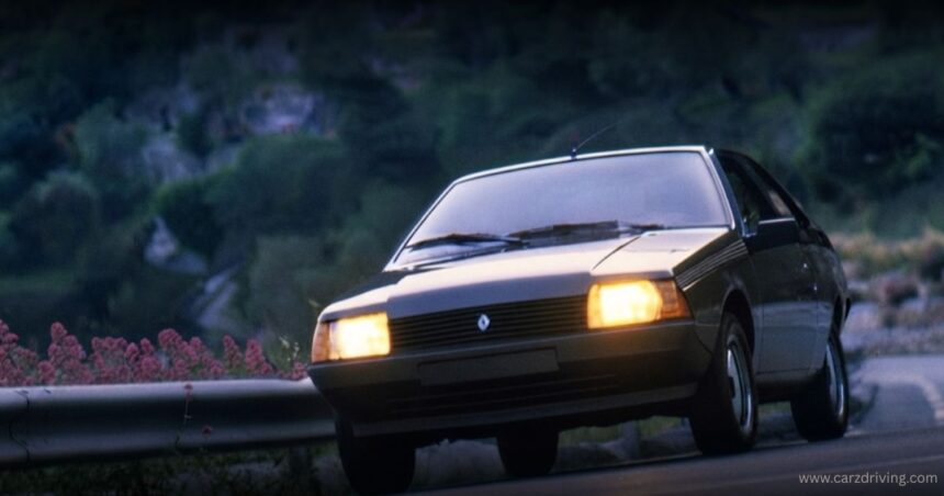 Front view of a classic R Fuego coupe illuminated at night.