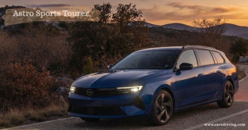 Blue Opel Astra Sports Tourer estate car driving on a scenic road at sunset.