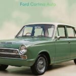 Front view of a restored vintage ford cortina auto in classic green