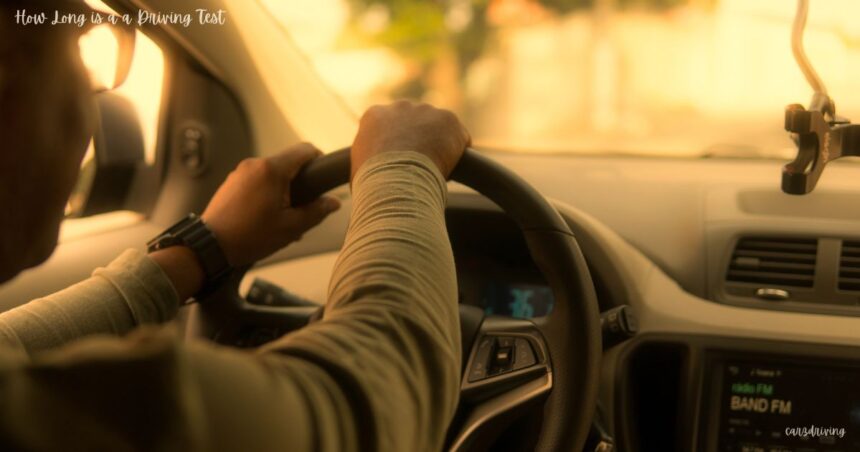 Driver holding the steering wheel of a car from a first-person perspective, illustrating a guide on how long is a driving test takes.