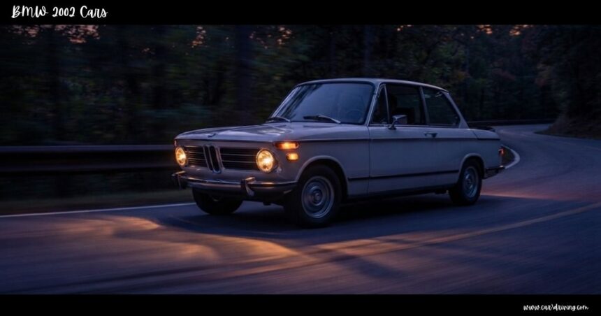 Vintage BMW 2002 cars sedan with headlights turned on driving along a quiet road at twilight.