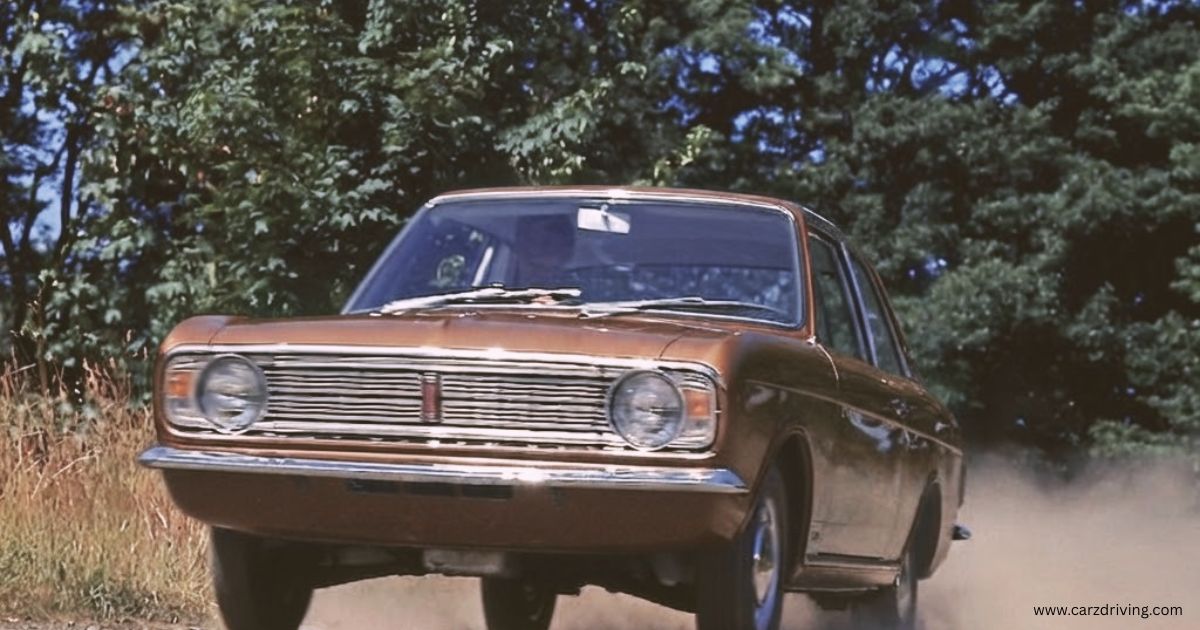 Front view of a brown vintage Ford Cortina auto driving outdoors