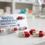 how old do you have to be to buy paracetamol A blister pack of Panadol Paracetamol Capsules BP 500mg, designed for pain and fever relief, resting on a white counter next to several red-and-white capsules.
