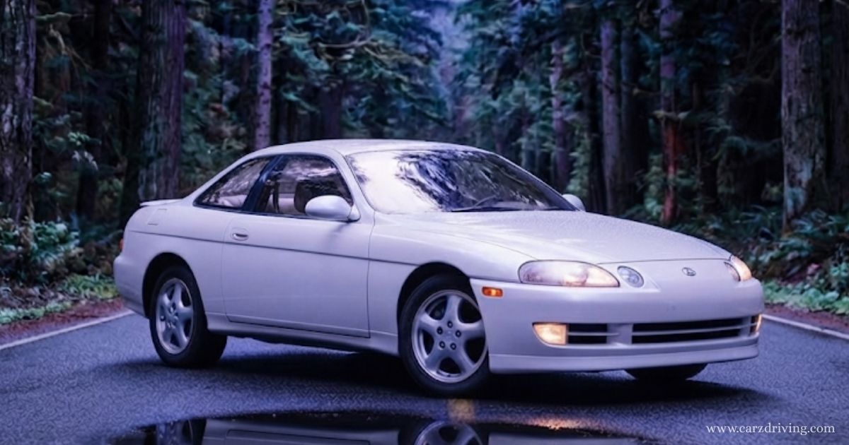 White Toyota Soarer coupe parked on a forest road.