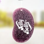 Purple glitter Jelly Belly hanging gel air freshener for car interiors.