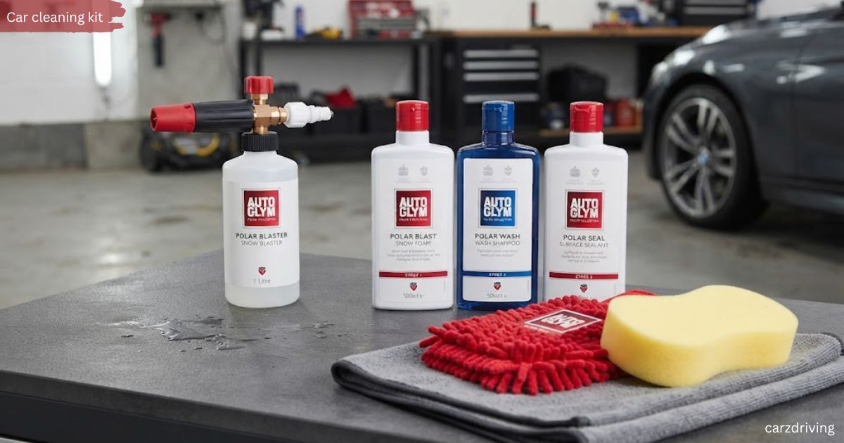Essential car cleaning kit showing Autoglym Polar Blaster pressure washer attachment, snow foam, shampoo, sealant, and car washing tools.