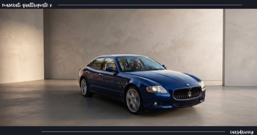 Blue Maserati Quattroporte V luxury sedan parked inside a modern studio showroom with neutral concrete textured walls and smooth flooring