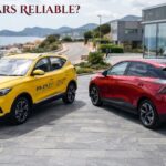 Are MG cars reliable question displayed above a yellow MG ZS EV crossover and a red MG4 hatchback