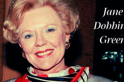 Portrait of Jane Dobbins Green smiling, wearing a red and striped scarf with bold text reading "Jane Dobbins Green" on the right.