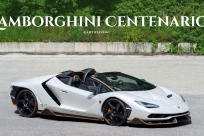 White Lamborghini Centenario Roadster convertible hypercar parked on pavement.