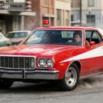 Starsky Hutch car red Ford Gran Torino with iconic white vector stripe speeding through city streets.