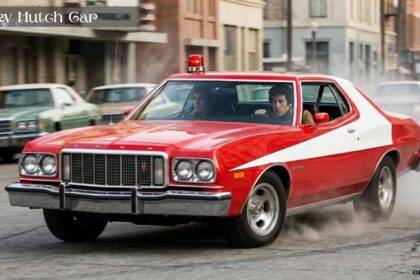 Starsky Hutch car red Ford Gran Torino with iconic white vector stripe speeding through city streets.